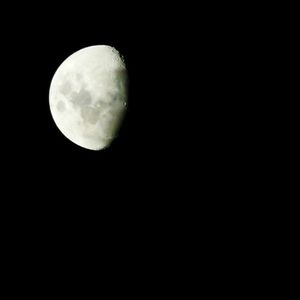 Low angle view of moon in sky
