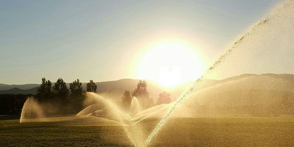 Scenic view of landscape against sky during sunset