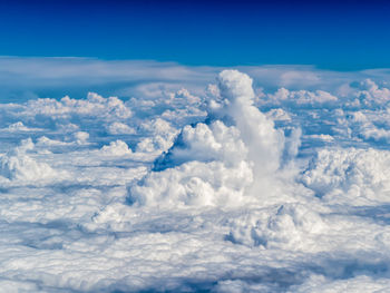 Aerial view of clouds against blue sky