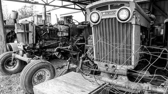 transportation, mode of transport, land vehicle, building exterior, built structure, architecture, car, stationary, day, metal, construction site, parked, abandoned, train - vehicle, outdoors, travel, public transportation, parking, industry, bicycle