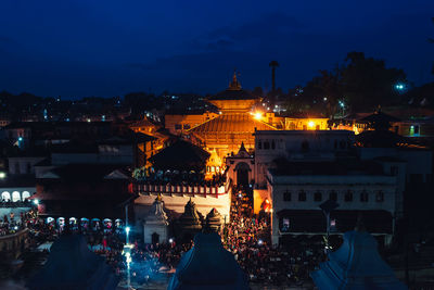 Pashupatinath temple in city against sky at night