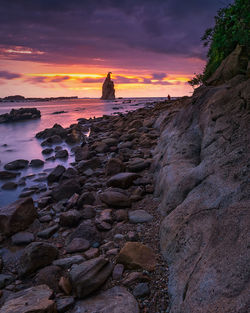 Scenic view of sea against sky at sunset