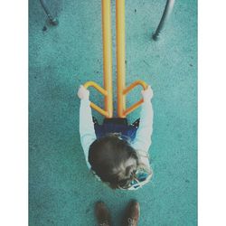 High angle view of girl playing on playground