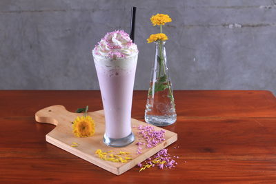 Close-up of ice cream in vase on table