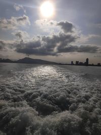 Scenic view of sea against sky during winter