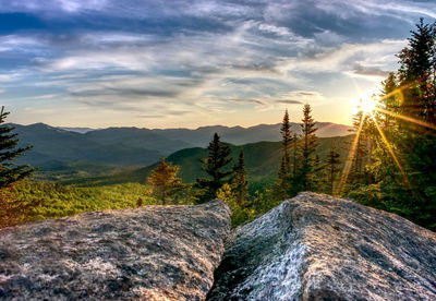 Scenic view of mountains against sky during sunset