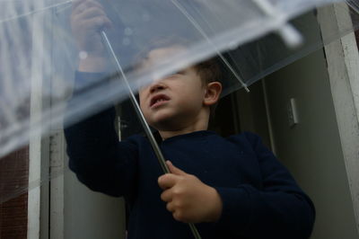 Boy standing outdoors