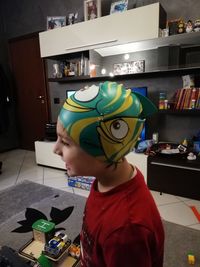 Portrait of boy with ice cream at home