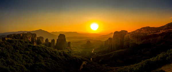 Scenic view of mountains against sky during sunset