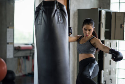 Woman exercising in gym