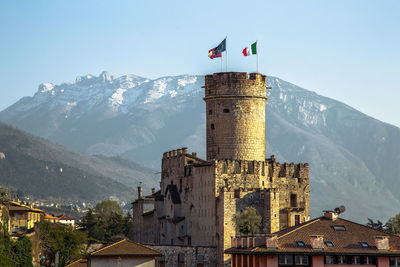 View of italian city skyline and buonconsiglio castle tower, trento, trentino alto adige, italy