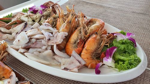 High angle view of fish in plate on table