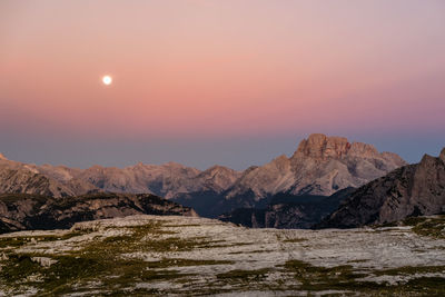 Scenic view of mountains against sky during sunset