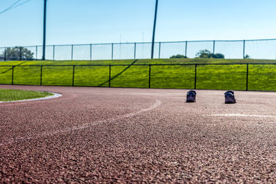 Sport shoes on running track field