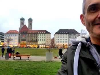 Woman standing in front of building