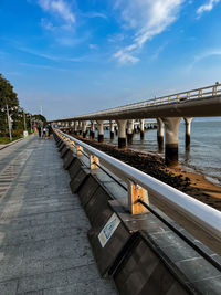 Pier over sea against sky