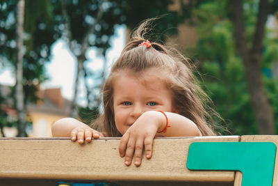 Portrait of cute girl outdoors