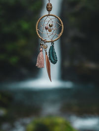 Close-up of decoration hanging against blurred background