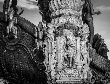 Low angle view of statue against sky