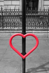 Close-up of red railing