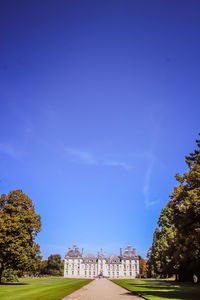 View of historical building against blue sky