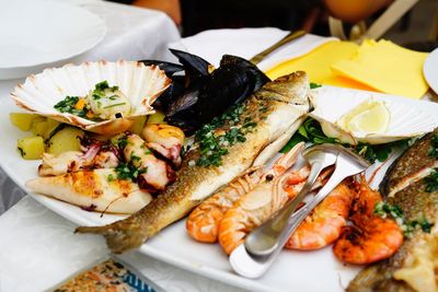 High angle view of fish served in plate on table