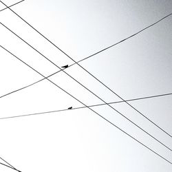 Low angle view of electricity pylon