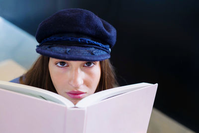 Young woman reading a book