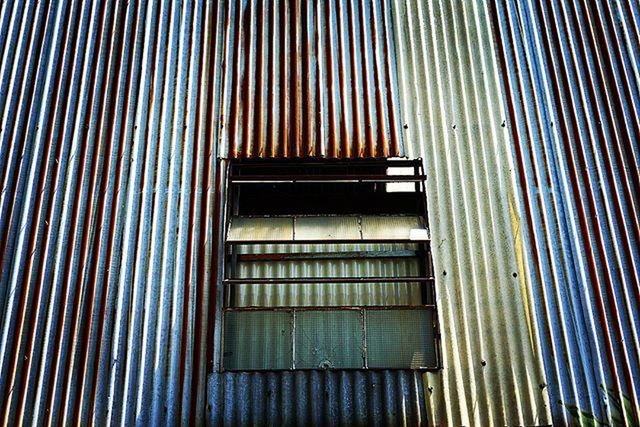 architecture, built structure, indoors, low angle view, building exterior, pattern, building, full frame, window, steps and staircases, no people, modern, backgrounds, staircase, steps, repetition, house, wall - building feature, metal, day