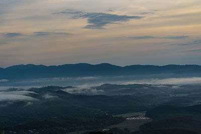 Scenic view of mountains against sky during sunset