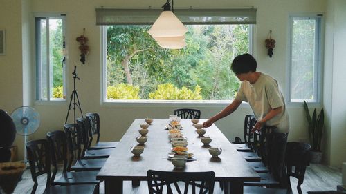 People standing on table