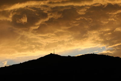 Scenic view of mountains at sunset