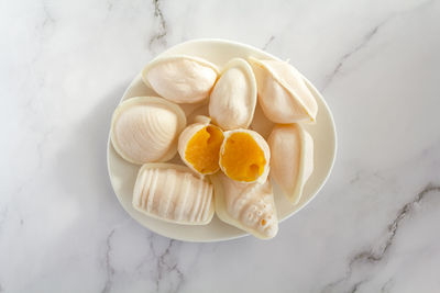 High angle view of oranges in bowl on table