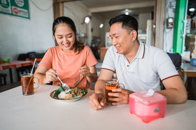 Friends having food at home