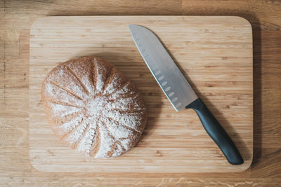 High angle view of bread on cutting board