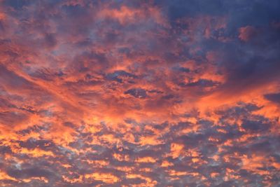 Low angle view of dramatic sky during sunset