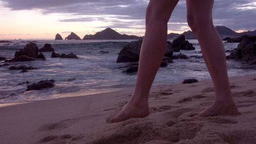 Low section of woman on beach