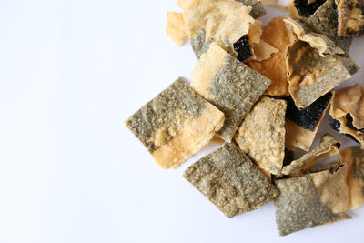 High angle view of bread on white background