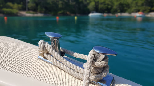 Closeup of nautical sailing knot on boat.