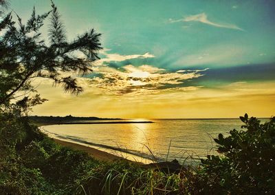 Scenic view of sea against sky during sunset