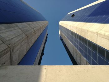 Low angle view of building against blue sky