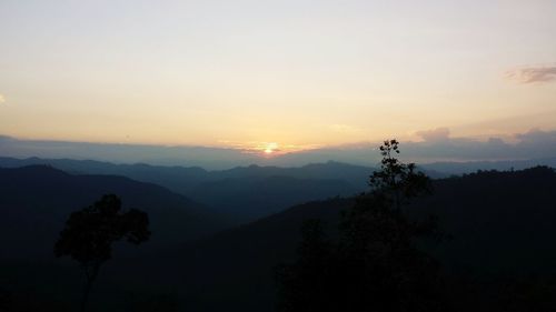 Scenic view of mountains at sunset