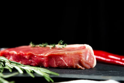 Close-up of sushi on cutting board