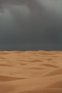 Scenic view of desert against sky