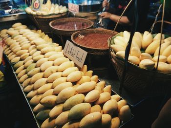 Mango fruits for sale at market during night