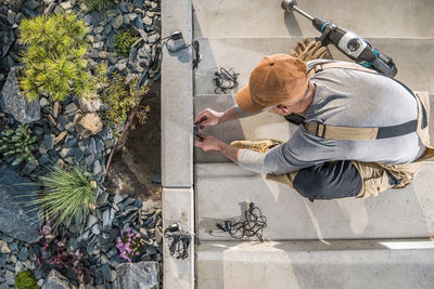 High angle view of man standing by plants