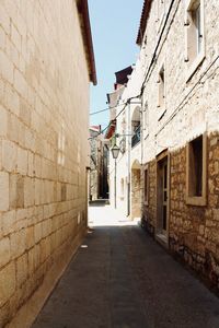 Narrow alley along buildings