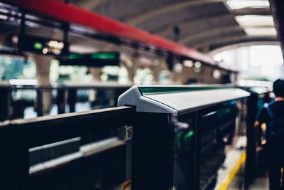 Blurred motion of train at railroad station