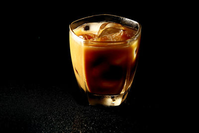 Close-up of coffee on black background