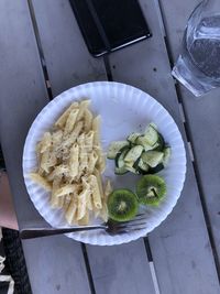 High angle view of fruits in plate on table